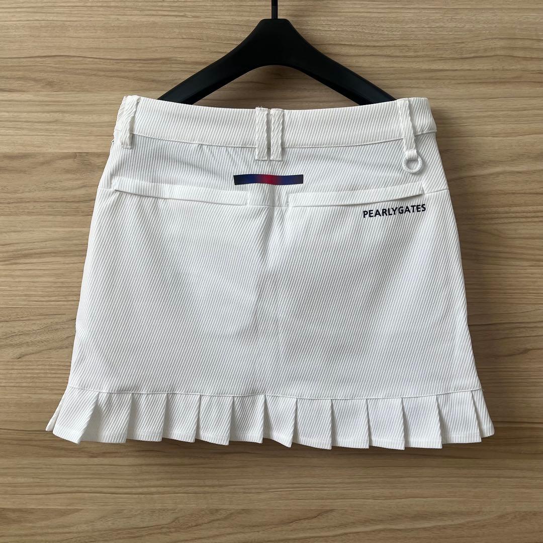 新品★46,200円 パーリーゲイツ ゴルフセットアップ ハイネック＆スカート白